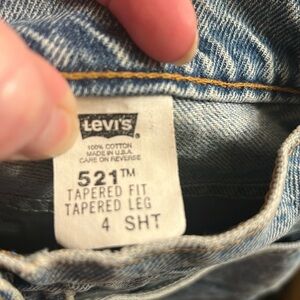 Vintage Women’s size 4 Levi’s 521 (shirt) light denim blue jeans